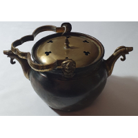 Koperen lavabo met deksel